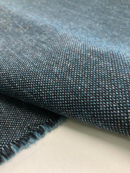 Unrecognized Woll contract fabrics.
