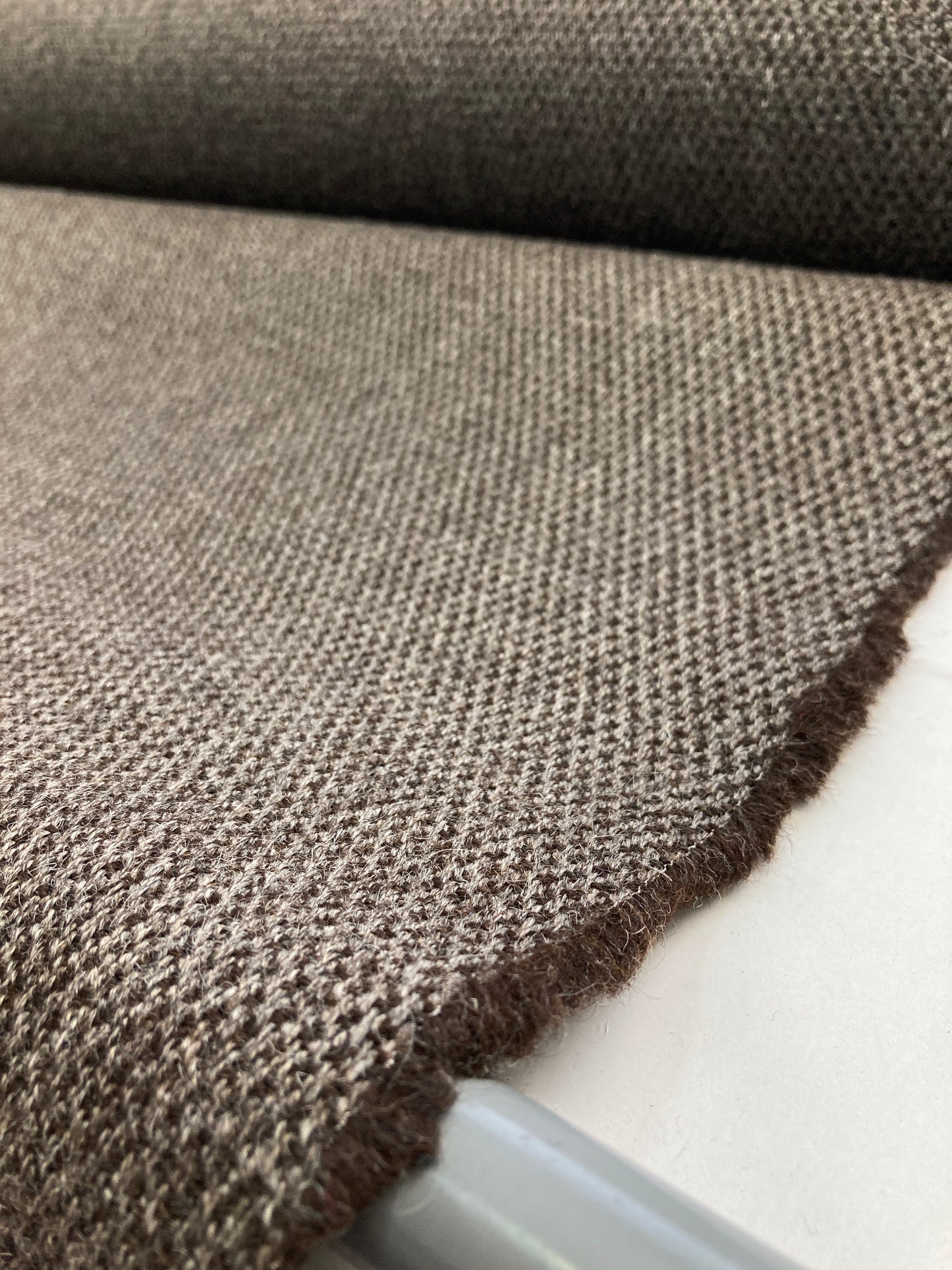 Unrecognized Woll contract fabrics.