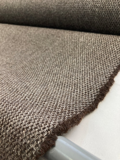 Unrecognized Woll contract fabrics.