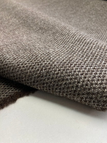 Unrecognized Woll contract fabrics.