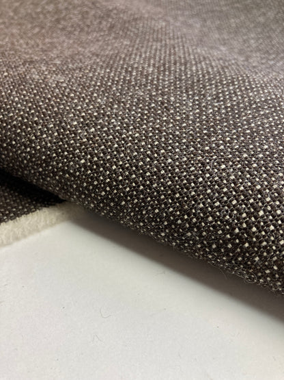 Unrecognized Woll contract fabrics.