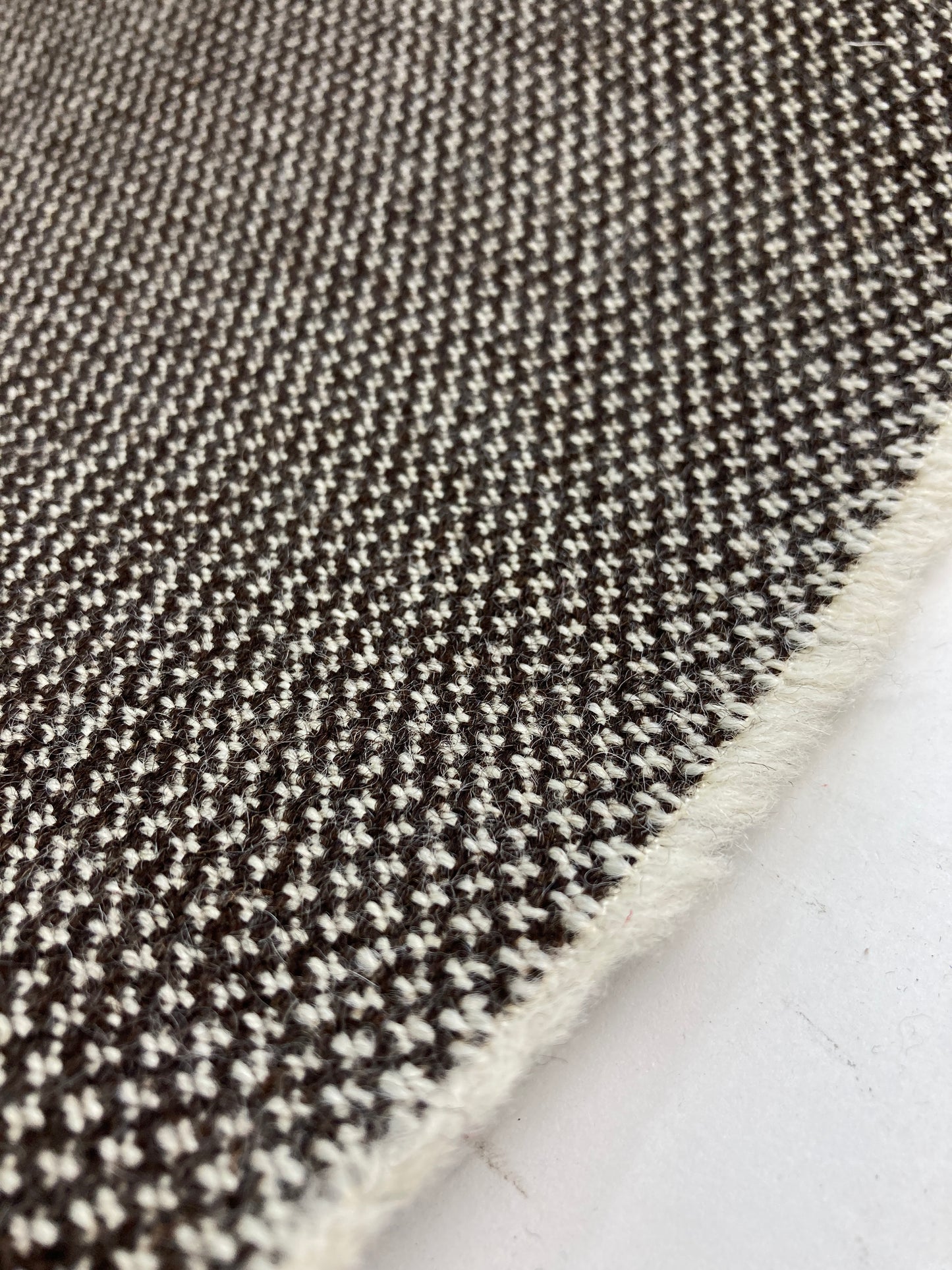 Unrecognized Woll contract fabrics.