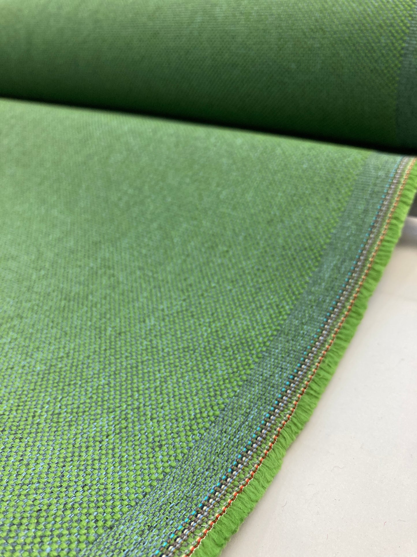 Synthetic contract fabrics used in the commercial sector.