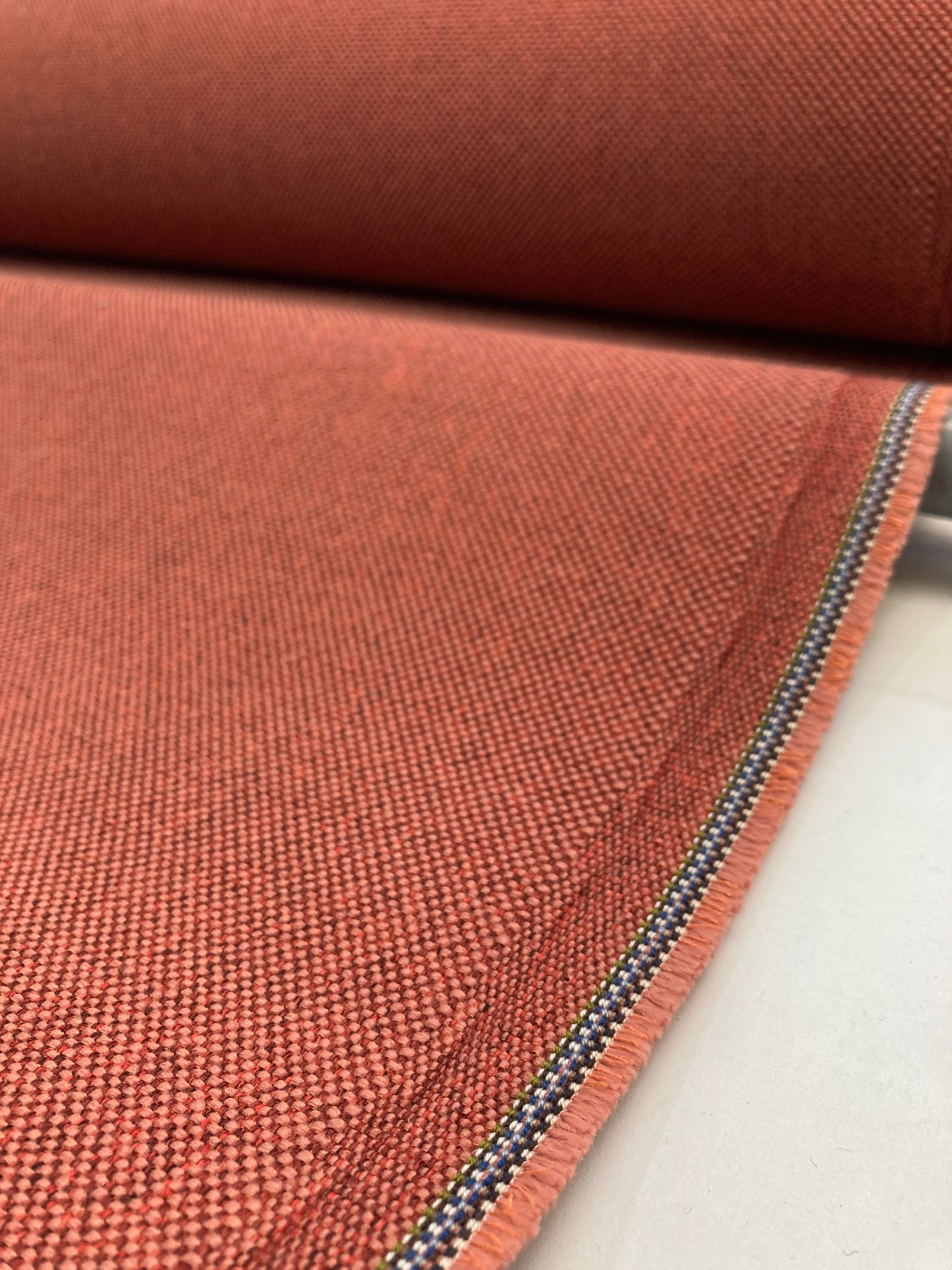 Synthetic contract fabrics used in the commercial sector.