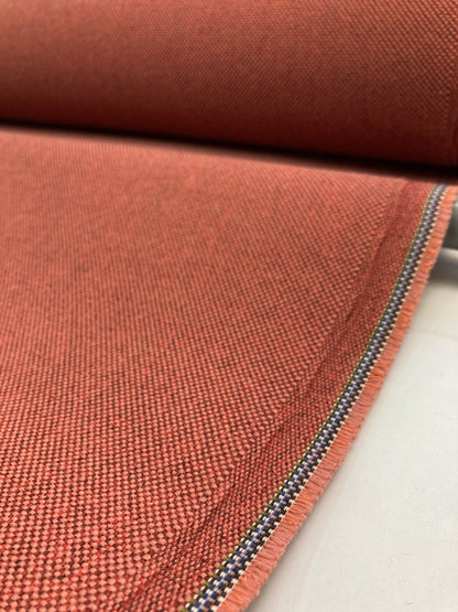 Synthetic contract fabrics used in the commercial sector.