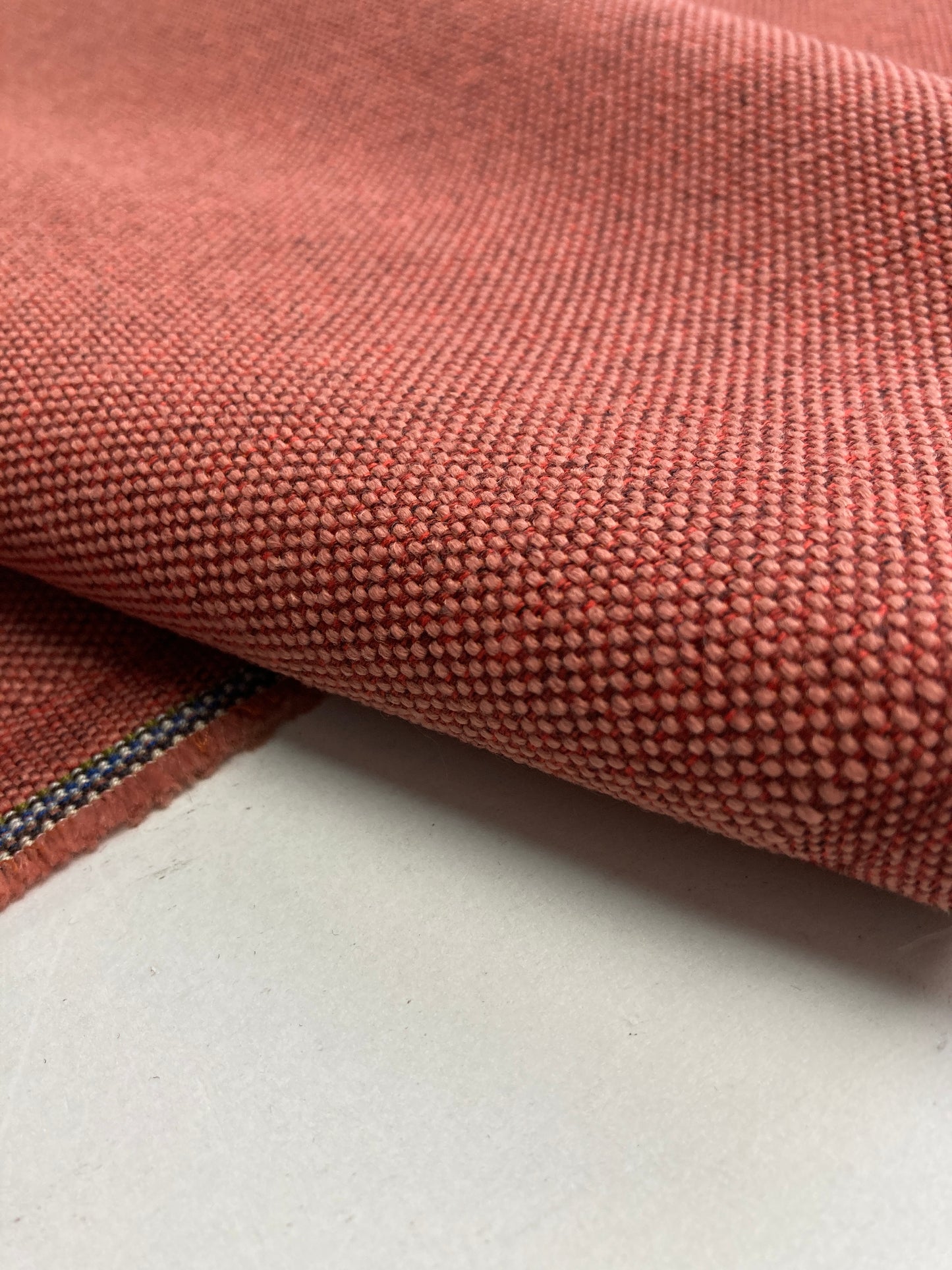 Synthetic contract fabrics used in the commercial sector.