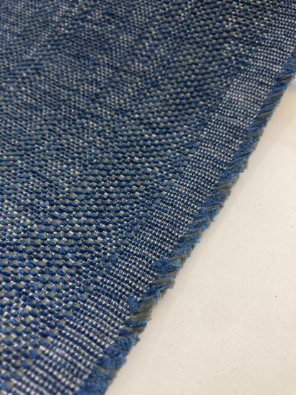 Synthetic contract fabrics used in the commercial sector.
